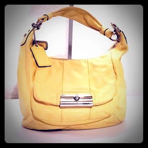 Yellow leather coach convertible